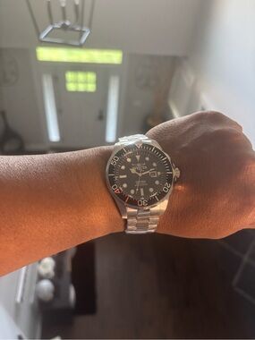 Invicta Silver Watch with Black Dial and Bezel